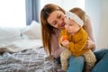 Happy loving family. Mother and child girl playing, kissing and hugging Royalty Free Stock Photo