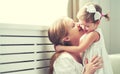 Happy loving family. mother and child playing, kissing and hugg Royalty Free Stock Photo