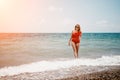 Happy loving family mother and daughter having fun together on the beach. Mum playing with her kid in holiday vacation Royalty Free Stock Photo