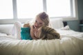 Happy loving family. Mother and her daughter child girl playing and hugging.on bed Royalty Free Stock Photo