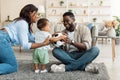 Portrait of happy black family smiling playing at home Royalty Free Stock Photo