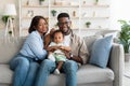 Portrait of happy black family smiling posing at home Royalty Free Stock Photo