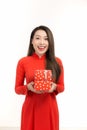 Happy lunar new year. young woman holding gift box Royalty Free Stock Photo