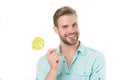 Happy macho with lollipop. Man smile with candy on stick isolated on white background. Food and snack. Unhealthy diet