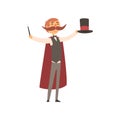 Happy magician standing with top hat and magic wand in hands. Man with big moustached, dressed in costume and red cloak Royalty Free Stock Photo