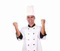 Happy male chef showing winning gesture with hands Royalty Free Stock Photo