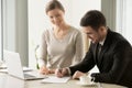 Female and male business leaders signing contract Royalty Free Stock Photo