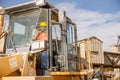 Manual worker driving cargo truck in plant Royalty Free Stock Photo