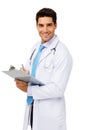 Happy Male Doctor Writing On Clipboard Royalty Free Stock Photo