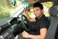 Happy male driver holding car keys Royalty Free Stock Photo