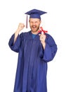 Happy Male Graduate In Cap and Gown with Diploma Isolated on White Royalty Free Stock Photo