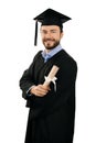 Happy male graduate with diploma isolated on white