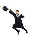 Happy male  graduate student running and jumping Royalty Free Stock Photo