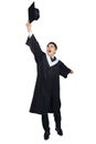 Happy male  graduate student throwing the cap Royalty Free Stock Photo