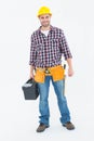 Happy male hanyman carrying toolbox