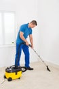 Janitor Cleaning Carpet Royalty Free Stock Photo