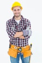 Happy male repairman wearing tool belt Royalty Free Stock Photo