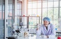 A happy male scientist showing the successful results of his experiment in a science lab Royalty Free Stock Photo