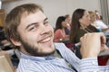 Happy Male Student Attending Lecture Royalty Free Stock Photo