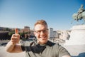 Happy male tourist taking selfie photo on background Venice Square in Rome Italy, blue sky. Travel concept Royalty Free Stock Photo