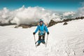 Happy Man alpinist climbing in mountains