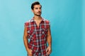 Man travel background plaid shirt guy trendy smile blue happy confident friendly arm attractive Royalty Free Stock Photo