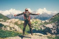 Happy Man with backpack jumping hands raised Royalty Free Stock Photo