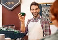 Happy man, barista and espresso for customer in coffee shop with cup for order, service and catering. Person, client or Royalty Free Stock Photo