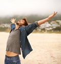 Happy man, beach and freedom with hands out for travel, adventure or outdoor sightseeing in nature. Excited male person Royalty Free Stock Photo