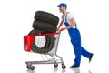 Happy man bought the tires for the car Royalty Free Stock Photo