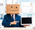 Happy man with box instead of his head