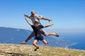 Happy man and boy jumping on a sky Royalty Free Stock Photo