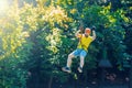 Young man enjoy active leisure in extreme rope park Royalty Free Stock Photo