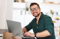 Happy man businessman, freelancer, student working at computer a Royalty Free Stock Photo