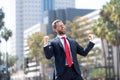 happy man businessman in suit and red tie celebrating business success express happiness, excitement Royalty Free Stock Photo