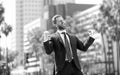 happy man businessman in suit and red tie celebrating business success express happiness, excitement Royalty Free Stock Photo