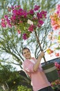 Happy Man Carrying Potted Plant Royalty Free Stock Photo