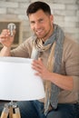 happy man changes electric light bulb Royalty Free Stock Photo