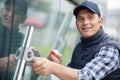 happy man cleaning windows Royalty Free Stock Photo