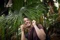 Happy man discovering jungle