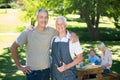 Happy man doing barbecue with his father Royalty Free Stock Photo