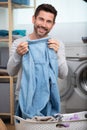 happy man doing laundry at home Royalty Free Stock Photo