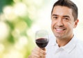 Happy man drinking red wine from glass Royalty Free Stock Photo