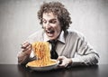 Happy Man Eating Spaghetti Royalty Free Stock Photo