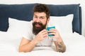 Happy man enjoy morning coffee. Fresh coffee. Happy morning. Bearded man drink morning coffee. happy bearded man in bed