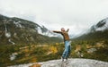 Happy man enjoying landscape view foggy forest mountains