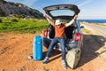 Happy man enjoying road trip and summer vacation. Travel, holidays and people concept Royalty Free Stock Photo