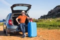 Happy man enjoying road trip and summer vacation. Travel, holidays and people concept Royalty Free Stock Photo