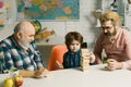 Happy man family concept laugh and have fun together. Generation of people and stages of growing up. Little boy enjoy Royalty Free Stock Photo