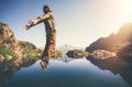 Happy Man Flying levitation jumping with lake and mountains on background Royalty Free Stock Photo